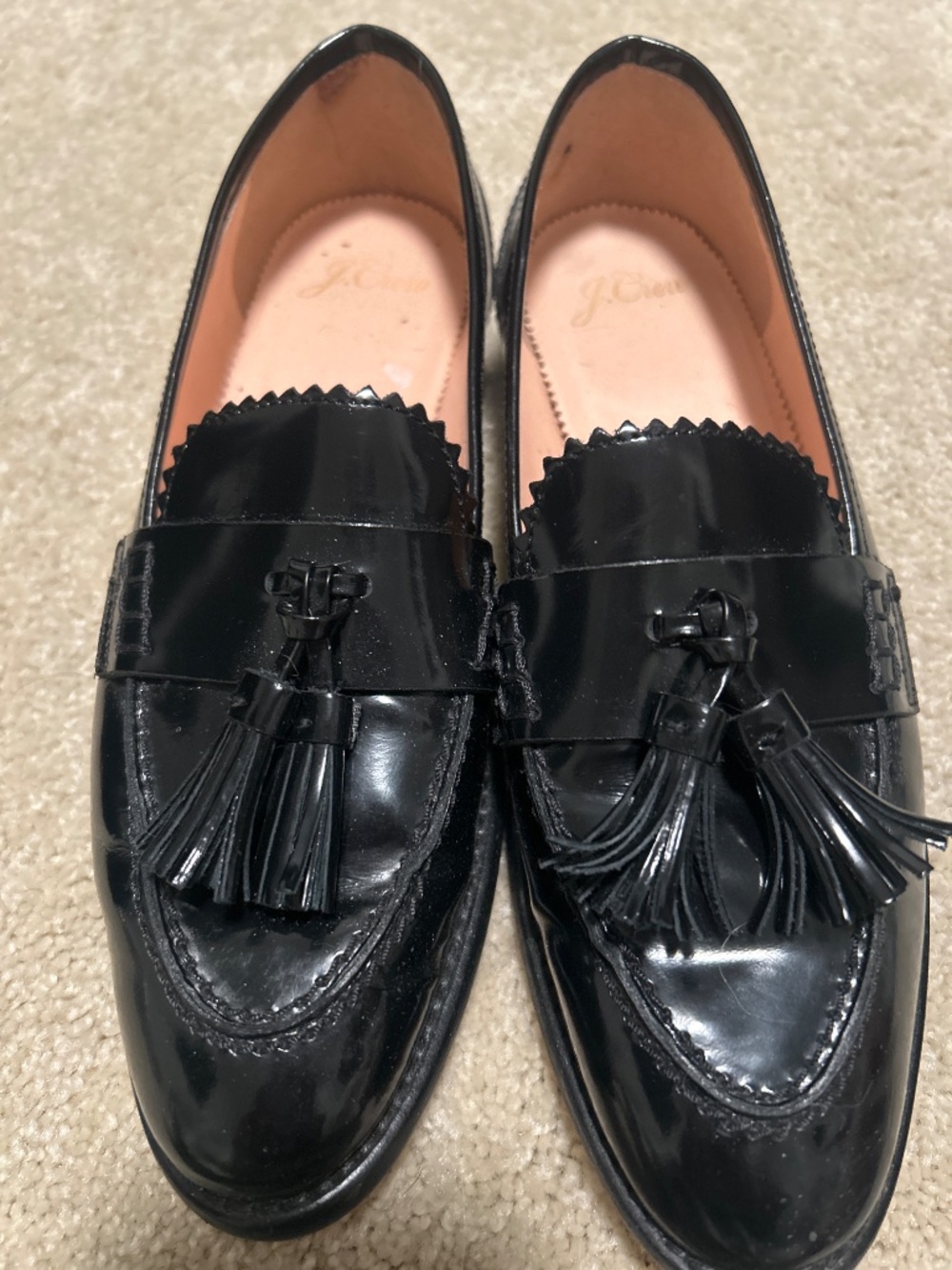 Black loafers with tassel
